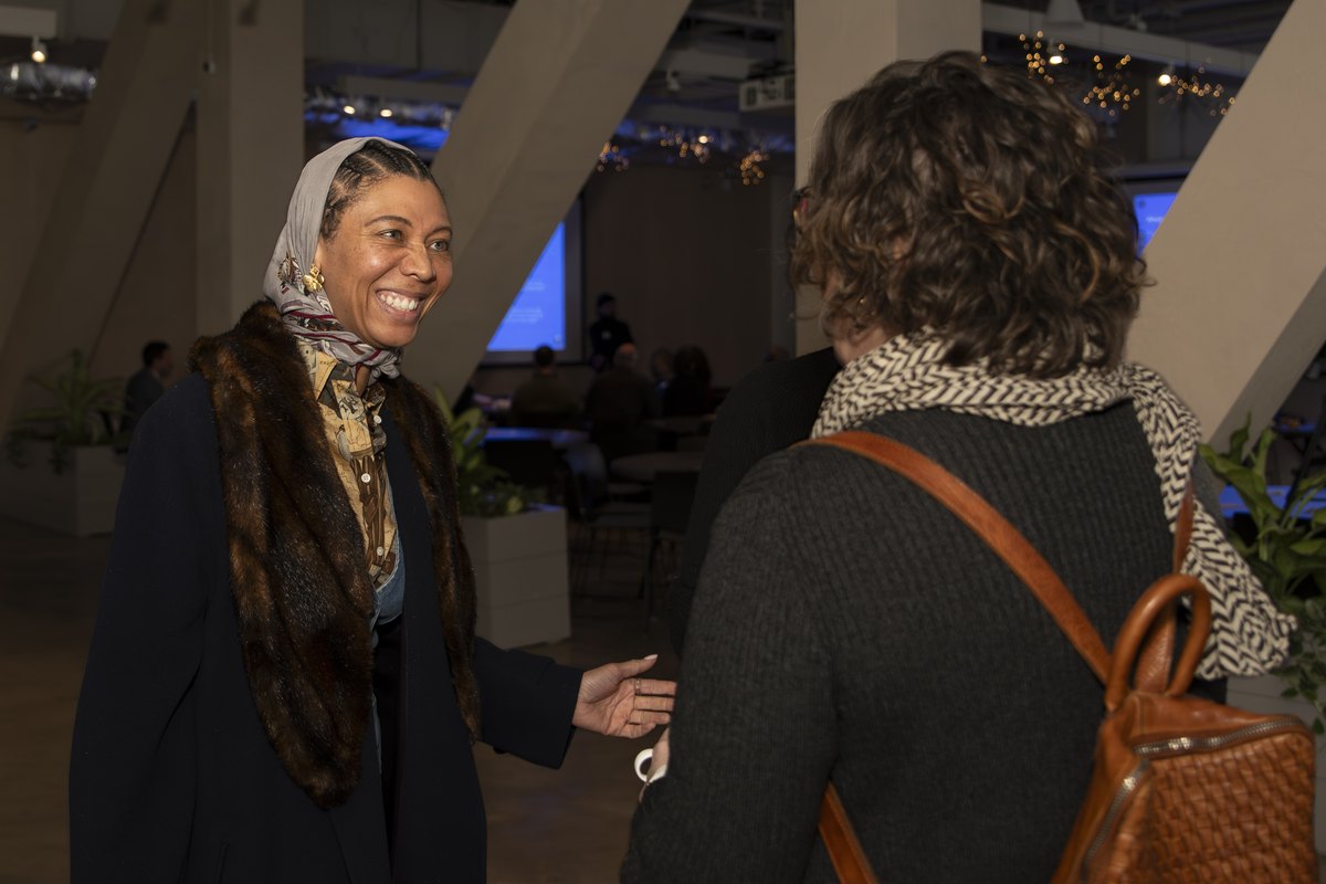 Two attendees in conversation during a SPARK networking session