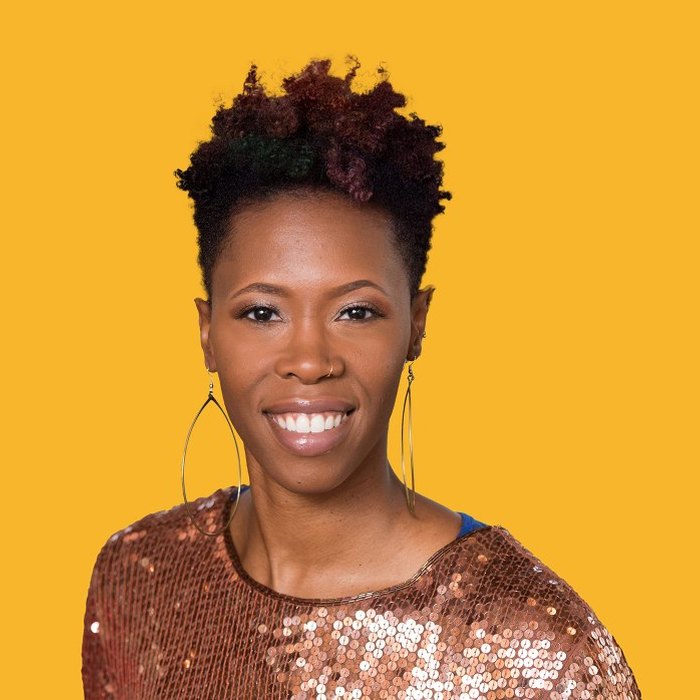 Portrait of a NOCAP program participant against a gold backdrop